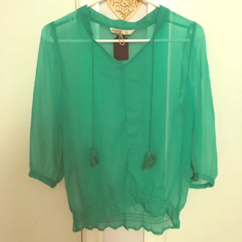 Beautiful sheer green tassel top!